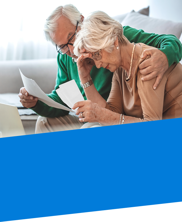 Senior couple reviewing estate planning documents